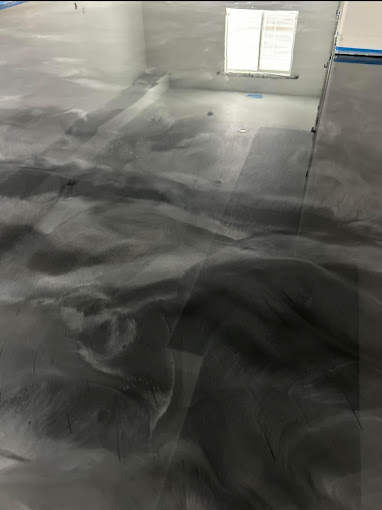 A picture of a room with a window in it