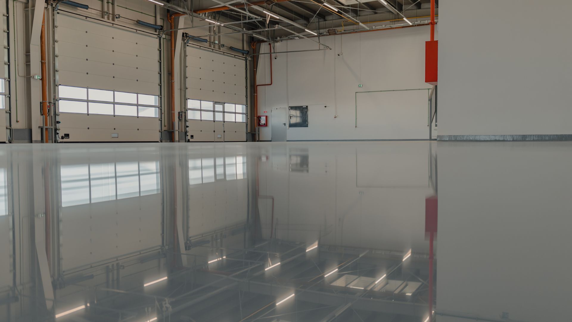 A large warehouse with a mirrored floor and walls
